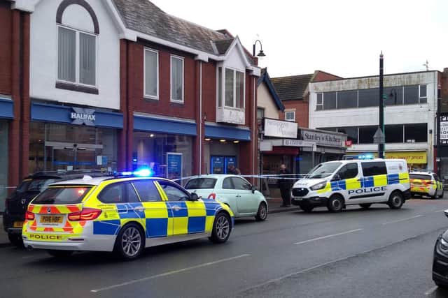 Police said Halifax bank was targeted by an armed robber demanding cash from staff at around 9.10am (December 12)