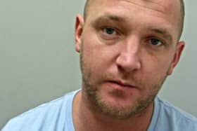 Kurt Baxter is wanted in connection with an investigation into a report of fraud (Credit: Lancashire Police)