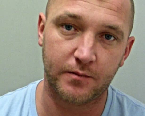 Kurt Baxter is wanted in connection with an investigation into a report of fraud (Credit: Lancashire Police)