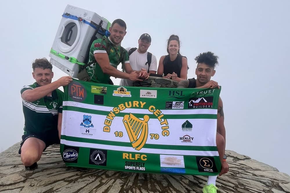 Tommy Dunford and supporters at the summit of Snowdon.