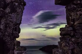 The northern lights captured through a wndow at Duntulm Castle in the north of Skye