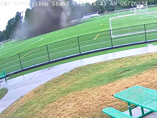 A massive sinkhole opened up and swallowed a light pole in the middle of a football pitch at Gordon Moore Park in Alton, Illinois, USA.