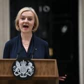 Britain’s Prime Minister Liz Truss delivers a speech outside of 10 Downing Street in central London on October 20, 2022 to announce her resignation.  (Photo by Daniel LEAL / AFP) (Photo by DANIEL LEAL/AFP via Getty Images)