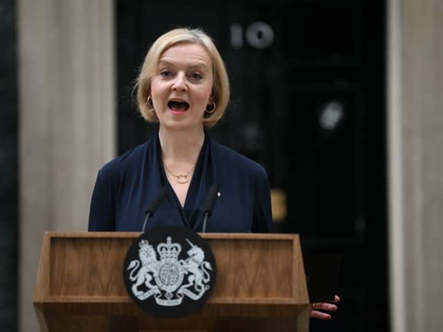 Britain’s Prime Minister Liz Truss delivers a speech outside of 10 Downing Street in central London on October 20, 2022 to announce her resignation.  (Photo by Daniel LEAL / AFP) (Photo by DANIEL LEAL/AFP via Getty Images)