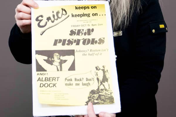 Claire Howell, music memorabilia consultant at Hansons Auctioneers, with the Sex Pistols poster.  