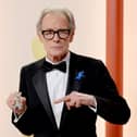 Bill Nighy and his rabbit companion at the 2023 Academy Awards.