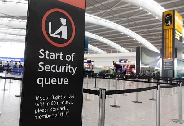 A sign indicating the start of the security queue during a strike by security workers at London Heathrow Airport in London, UK, on Friday, March 31, 2023. IAG SAs British Airways is set to scrap 320 flights during the Easter week as security workers strike for 10-days over pay. Photographer: Chris Ratcliffe/Bloomberg via Getty Images