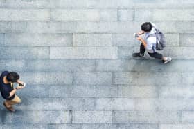 Award-winning children’s newspaper First News is warning young people about the dangers of crossing the road while using their mobile phones (Adobe)