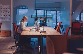 Businesswoman working at night