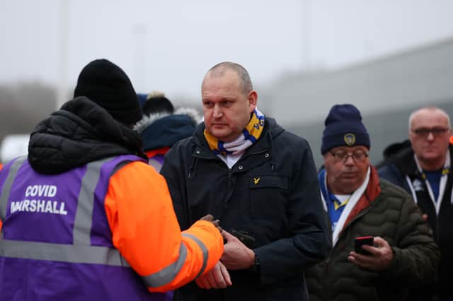 Fans have their Covid-19 passes checked as they arrive at the stadium prior to the Premier League match between Leeds United and Arsenal (Photo: Getty)