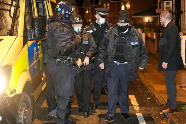 Boris Johnson (second from right) attended a county lines-related police raid in Liverpool to launch his new drugs strategy (image: Getty Images)