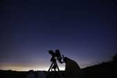 Members of the York Astronomical Society prepare to view the annual Perseids meteor shower in the village of Rufforth, near York, in August 2015 (Photo: OLI SCARFF/AFP via Getty Images)