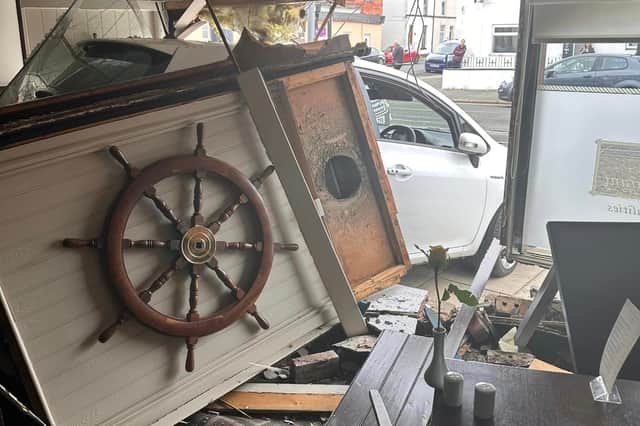A driver drover through the window of the Trafalgar Restaurant in Albert Street, Fleetwood today