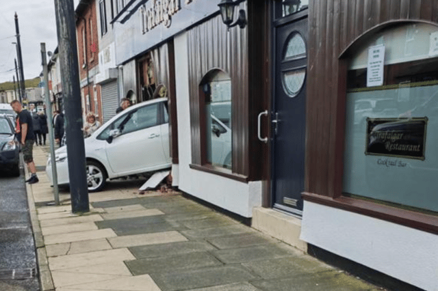 A driver reversed his white car through the window of the Trafalgar Restaurant in Albert Street, Fleetwood today