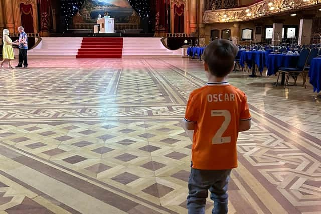 Oscar sporting histangerine Seasiders shirt at Blackpool Tower Ballroom.