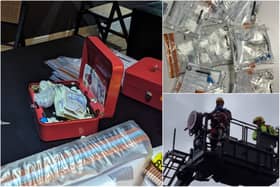 A bag containing two lock boxes full of drugs was recovered after being spotted on the roof of a property (Credit: Lancashire Police) 