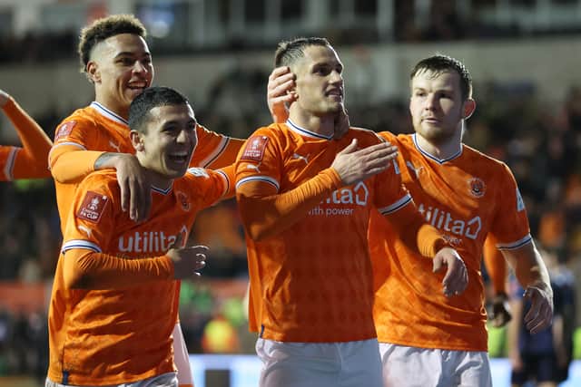 Jerry Yates, centre, celebrates scoring Blackpool’s fourth goal in last season’s 4-1 FA Cup win against Nottingham Forest