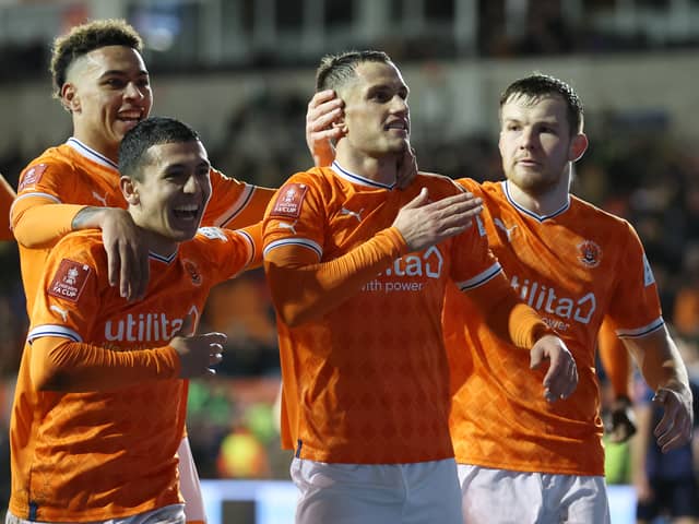 Jerry Yates, centre, celebrates scoring Blackpool’s fourth goal in last season’s 4-1 FA Cup win against Nottingham Forest