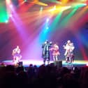Boy George performs boy Karma Chameleon on stage at Blackpool Winter Gardens in Peter Pan