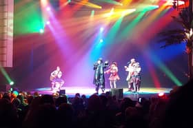Boy George performs boy Karma Chameleon on stage at Blackpool Winter Gardens in Peter Pan