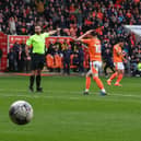 Referee Ben Atkinson has Sonny Carey in a state of disbelief during Blackpool’s game against Peterborough on Satruday