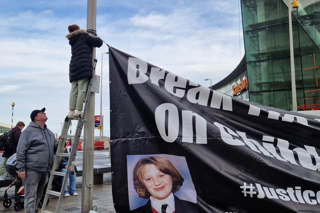 Members of the Justice for Charlene Downes facebook group fixed a 3m x 6m banner, in view of the social services office located within Bickerstaffe House, on Talbot Road.
