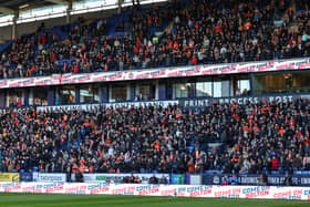 A general view of Blackpool fans at Bolton as they fill the two tiers. 