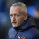 Blackpool's Manager Neil Critchley looks on.