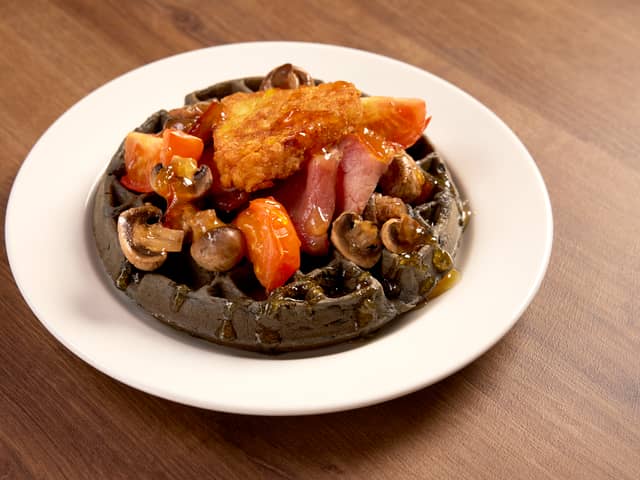 Black pudding and bacon batter, hash browns, tomatoes, mushrooms, with bacon and orange marmalade drizzle. Hampton by Hilton is trailaling limited edition British Breakfast Waffle Trio as part of its free hot breakfast included in every stay