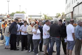 Blackpool fans queue for season tickets in May 2010 after the Seasiders' promotion to the Premier League