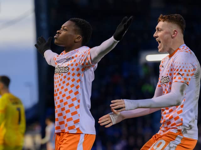 Karamoko Dembélé celebrates Blackpool's second goal in their 4-0 win against Portsmouth at Fratton Park.