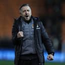 Jon Brady celebrates Northampton's win at Blackpool last week