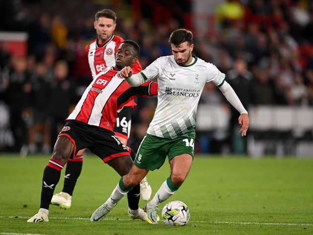 Daniel Mandroiu is a free agent and has spoken to Blackpool this summer. (Image: Getty Images)