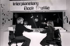 Darren Wilson and Amanda Maunder, both aged nine, and third year pupils at Baines Endowed Primary School, Marton, at the controls of the Interplanetary Book Shuttle at Marton Library in February 1983
