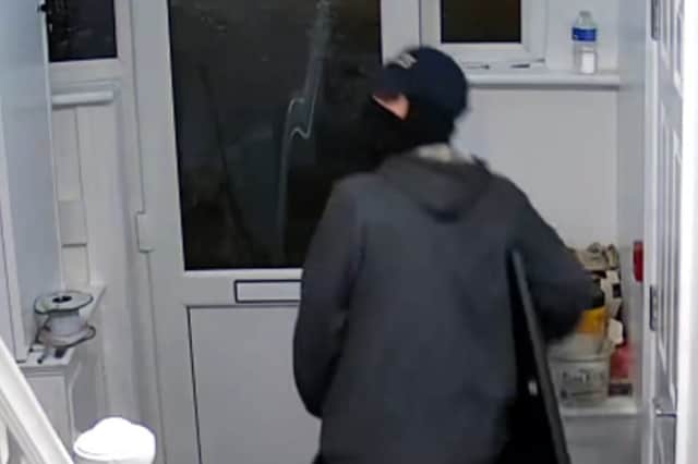 Burglars caught on CCTV looting home in Christmas break-in