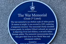 The new blue plaque at the War Memorial