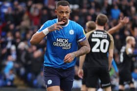 Peterborough striker Jonson Clarke-Harris is wanted by former Blackpool boss Michael Appleton at Charlton