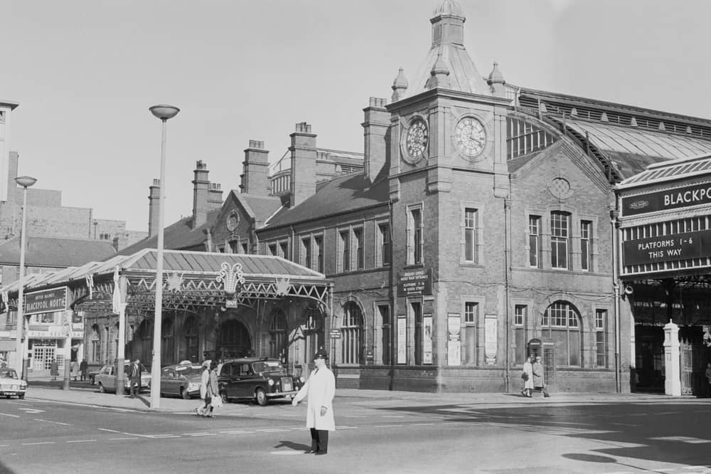 A police officer directing traffic near Blackpool North railway station, Blackpool, UK, 8th November 1968
