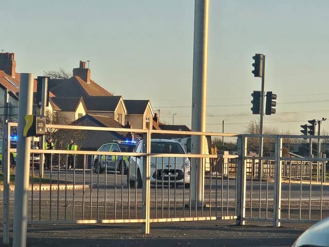 A flatbed truck ended up on its side after a crash on Norcross Roundabout 