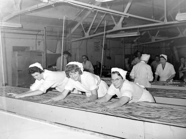 Rock rolling in a sweet factory in George Street, Blackpool. Pictured centre is the area Candy Queen Lisa Hart