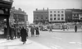 View from Grand Theatre , Church Street in 1952 looking towards the jewellers shops on Market Street. The County Hotel can be seen in the distance on the left and on the right is the site which once included the old St Johns Market which was replaced by the new one in King Street in 1938. Btitish Home Stores and a multi storey car park was later built on this site.