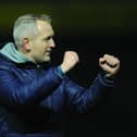 Blackpool boss Neil Critchley celebrates the Seasiders' victory at Bristol Rovers