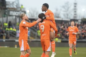 Blackpool's Karamoko Dembele celebrates with Kyle Joseph after scoring against Bristol Rovers. (Image: CameraSport - Ian Cook).