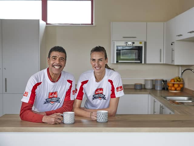 Howdens Game Changer Programme ambassadors Chris Kamara MBE and Jill Scott MBE in a grassroots football club kitchen