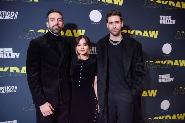L to R: Jamie Childs, Jenna Coleman and Oliver Jackson-Cohen attend the UK Premiere of "Jackdaw". (Photo by Matt McNulty/Getty Images)