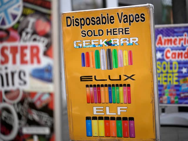 Advertising boards promote vaping devices outside a shop in Manchester (Photo: Christopher Furlong/Getty Images)