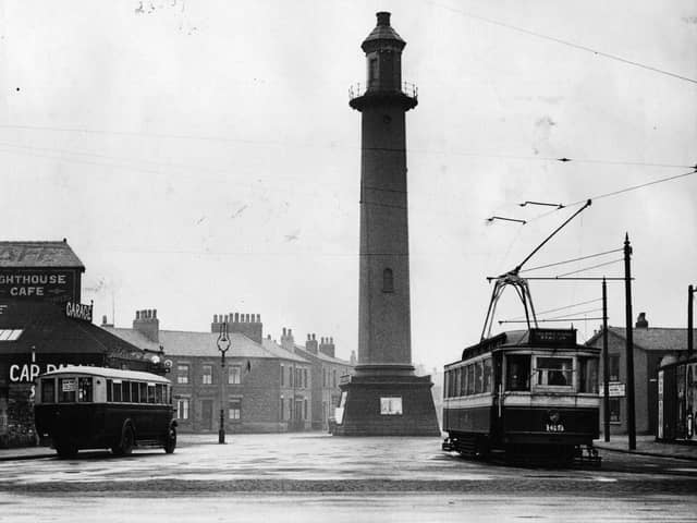 10th May 1934:  Pharos Lighthouse, tall and prominent located in the heart of Fleetwood.  A tram and bus pass by.  (Photo by Fox Photos/Getty Images)