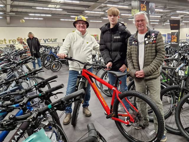 Live Like Ralph - David Nuttall (left) and Neil Roberts (right) took young Callum (centre) to pick out a new bike after his was stolen by a machete-wielding thug