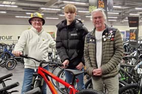 Live Like Ralph - David Nuttall (left) and Neil Roberts (right) took young Callum (centre) to pick out a new bike after his was stolen by a machete-wielding thug