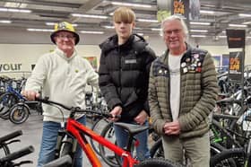 Live Like Ralph - David Nuttall (left) and Neil Roberts (right) took young Callum (centre) to pick out a new bike after his was stolen by a machete-wielding thug
